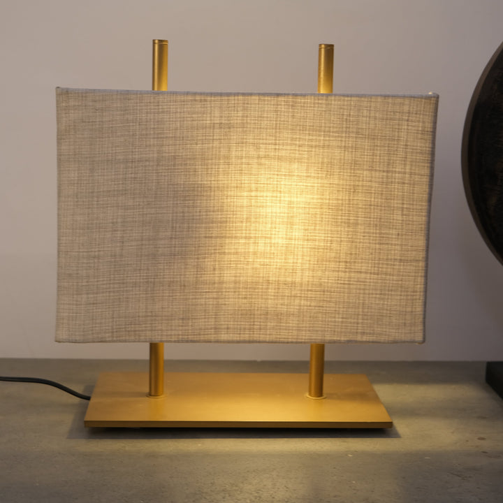 Warm Ambiance: Fabric Shade and Sturdy Metal Base Lamp